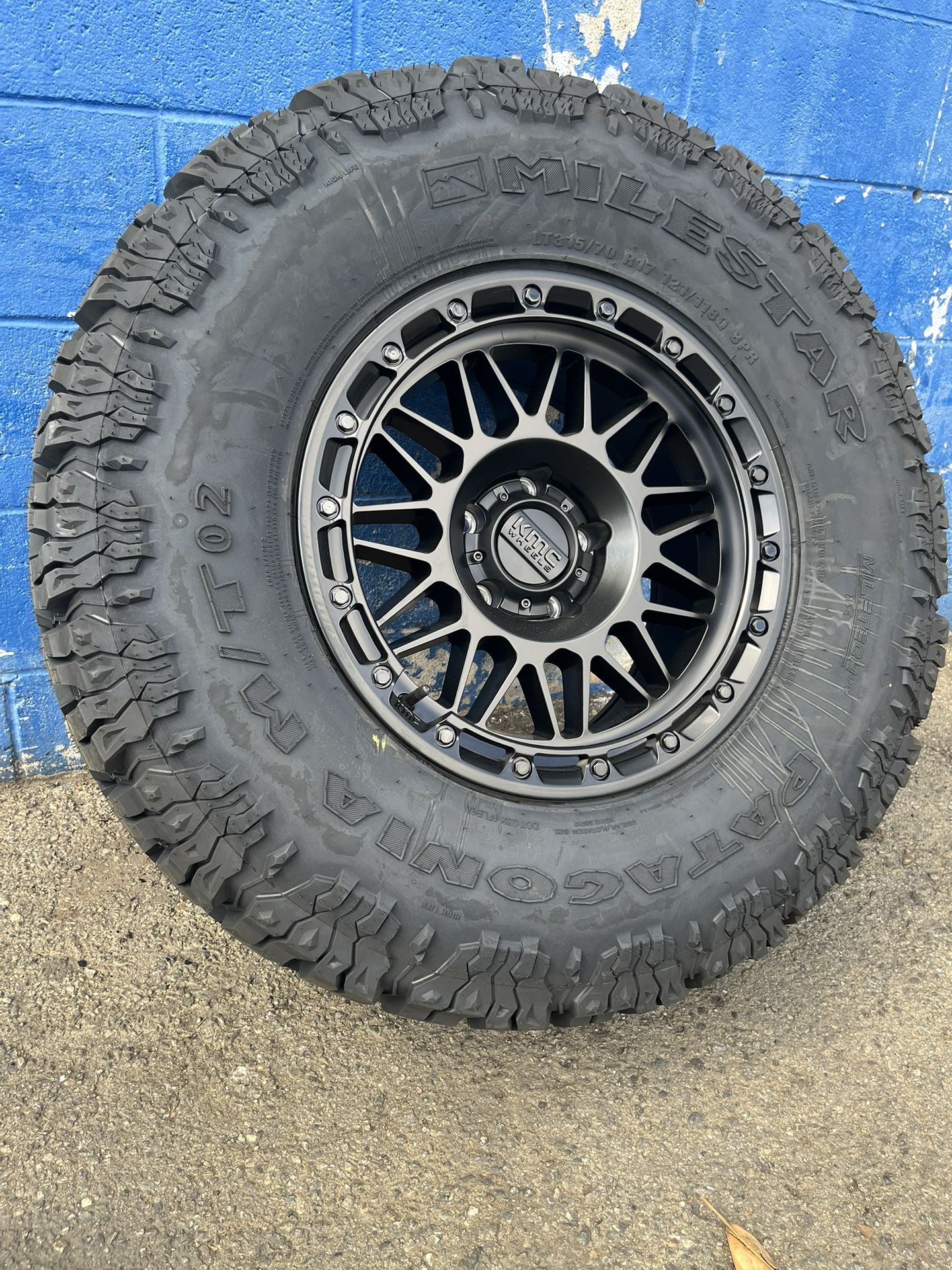KMC KM555 Attack Wheels 17”5x5/Milestar Patagonia M/TO2 315-70-17 Matte Black
